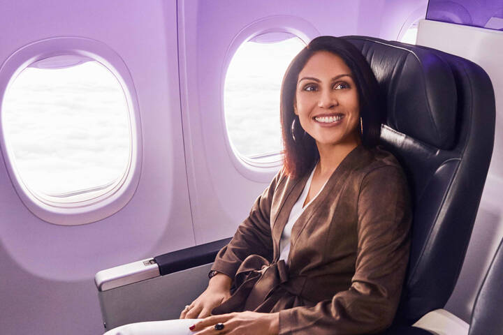 Woman sittin on Virgin Australia plane