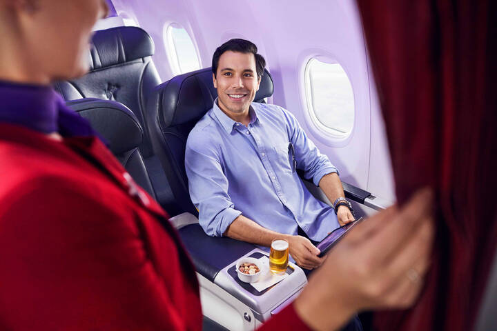 Virgin Australia Passanger seated in an Economy X Seat