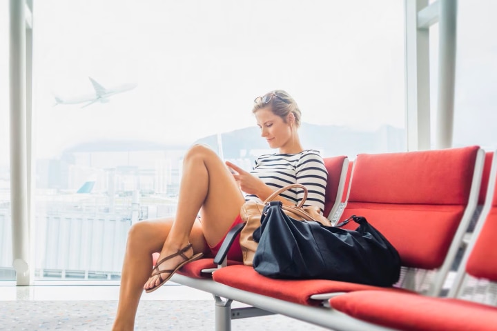 Image of woman in a cozy bedroom