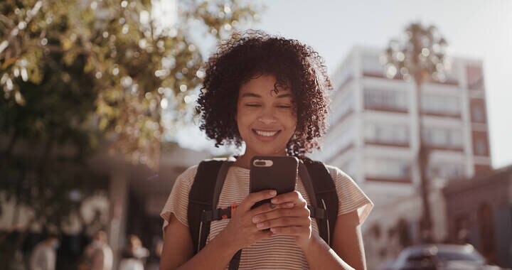 image of a woman on her mobile phone