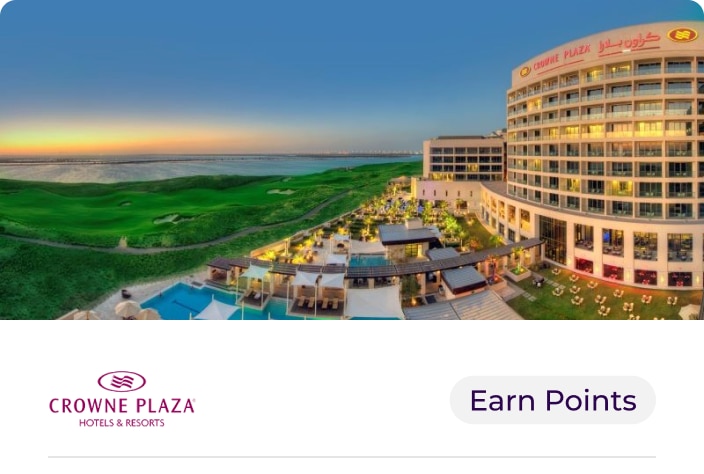 Image of the exterior of Crowne Plaza, Yas Island, Abu Dhabi overlooking the pool and ocean