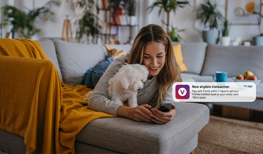 Image of a man paying for an onboard purchase